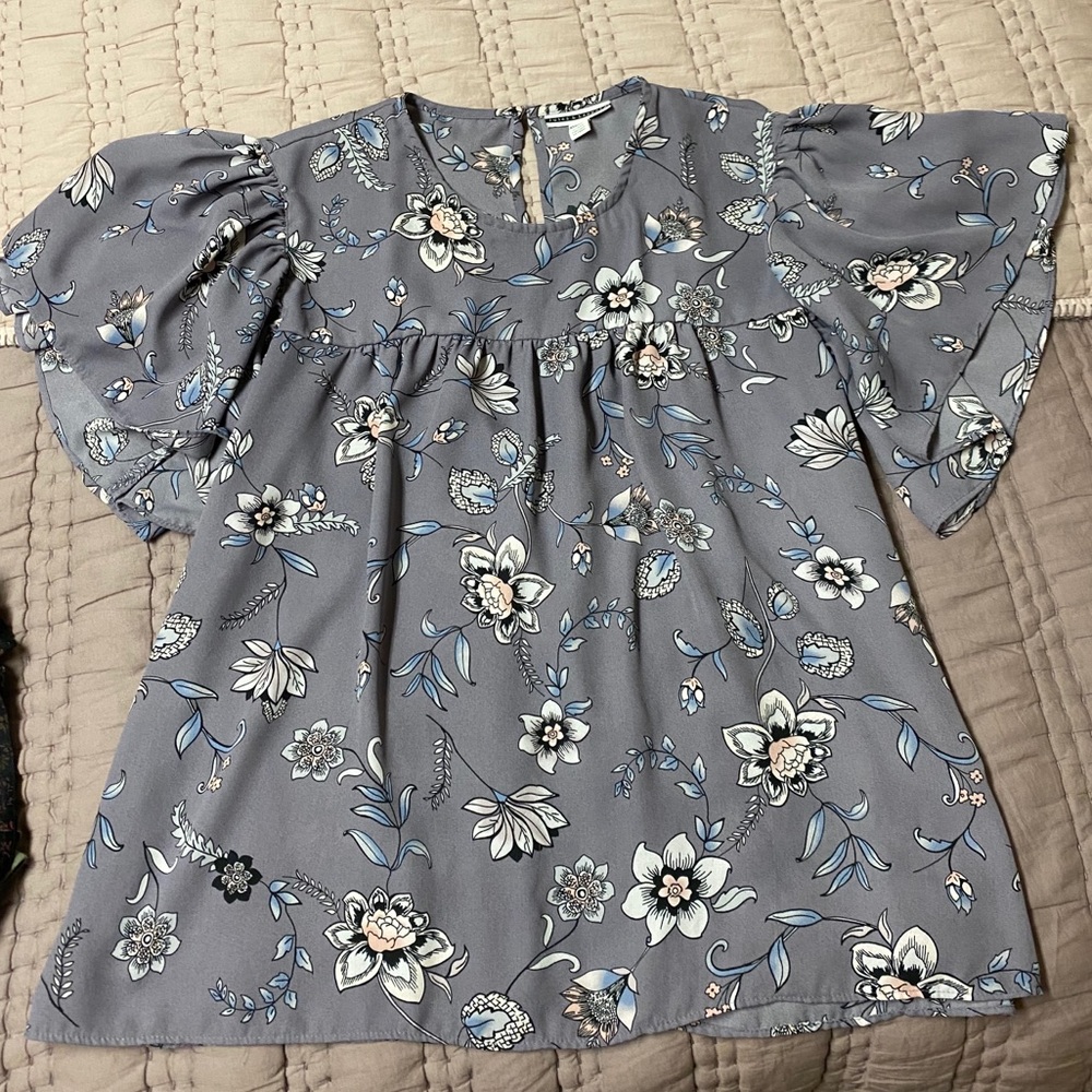 Purple flowery blouse